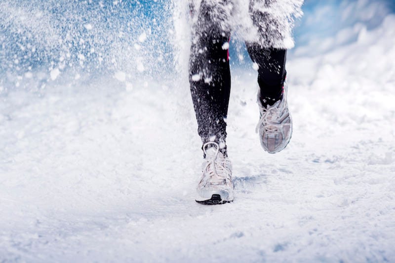 Winter running woman